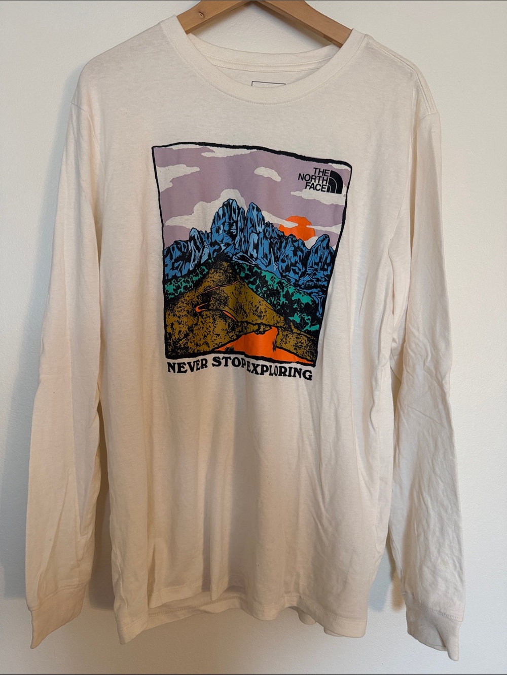 The North Face Cream Long Sleeve Graphic Tee with Multicolor Mountain Print